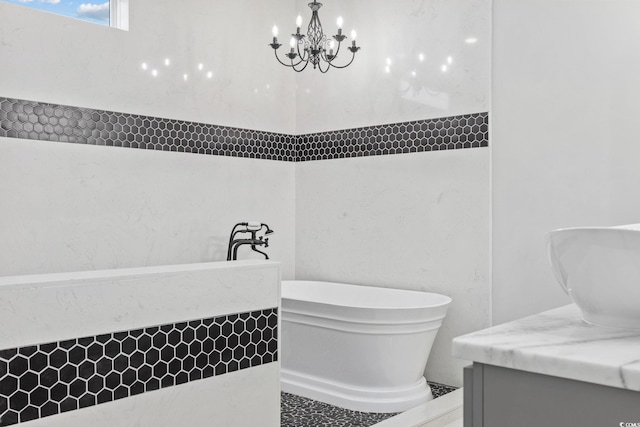 5540 Whitebark Dr, Myrtle Beach, SC 29577 - bathroom featuring a freestanding tub, vanity, and a chandelier