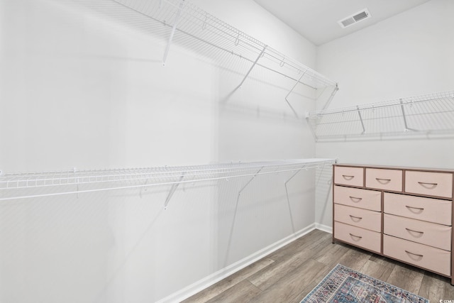 5540 Whitebark Dr, Myrtle Beach, SC 29577 - walk in closet featuring light wood-type flooring