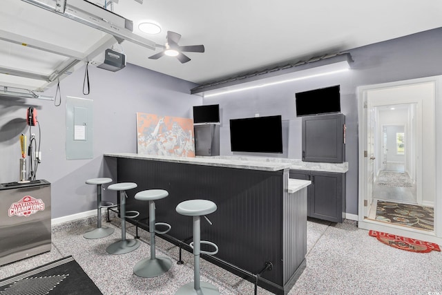 5540 Whitebark Dr, Myrtle Beach, SC 29577 - indoor dry bar with dark aggregate flooring, electric panel, and a ceiling fan