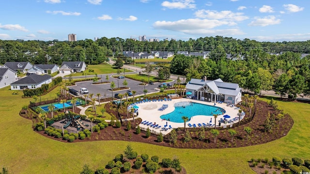 5540 Whitebark Dr, Myrtle Beach, SC 29577 - aerial view of a pool and a tree filled landscape