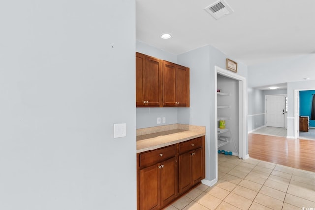 632 Kindred Dr, Myrtle Beach, SC 29588 - kitchen featuring light countertops and light tile patterned flooring