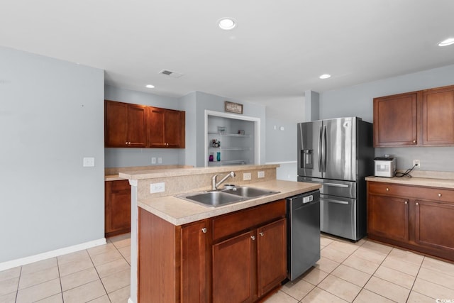 632 Kindred Dr, Myrtle Beach, SC 29588 - kitchen with dishwashing machine, stainless steel refrigerator with ice dispenser, a center island with sink, light countertops, and light tile patterned floors