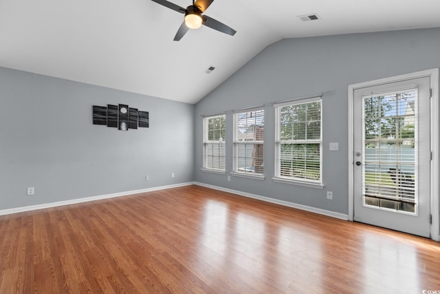 632 Kindred Dr, Myrtle Beach, SC 29588 - unfurnished room featuring ceiling fan, plenty of natural light, vaulted ceiling, and wood finished floors