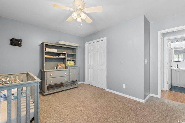 632 Kindred Dr, Myrtle Beach, SC 29588 - bedroom with carpet, a closet, ceiling fan, and a nursery area