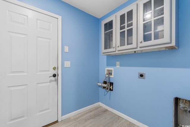 632 Kindred Dr, Myrtle Beach, SC 29588 - washroom with electric dryer hookup, cabinet space, light wood finished floors, and hookup for a washing machine