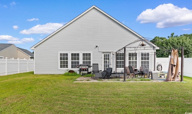 632 Kindred Dr, Myrtle Beach, SC 29588 - rear view of property with a patio and a fenced backyard