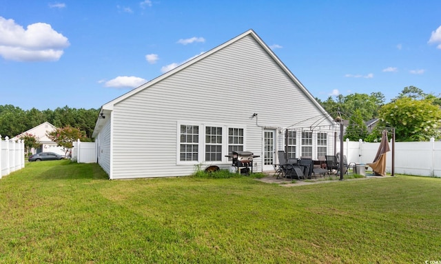 632 Kindred Dr, Myrtle Beach, SC 29588 - rear view of property with a fenced backyard and a patio area