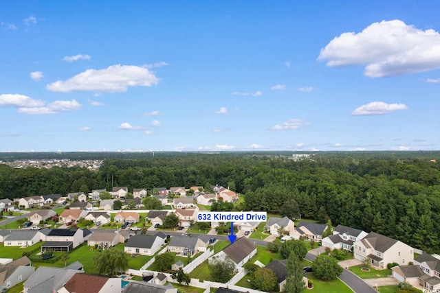632 Kindred Dr, Myrtle Beach, SC 29588 - aerial view of property's location with nearby suburban area and a forest