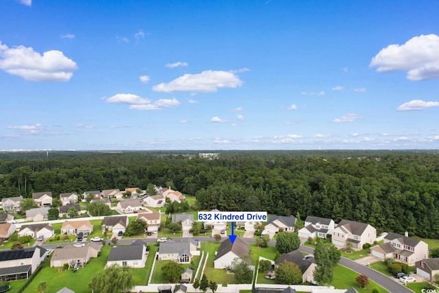 632 Kindred Dr, Myrtle Beach, SC 29588 - aerial perspective of suburban area featuring a heavily wooded area