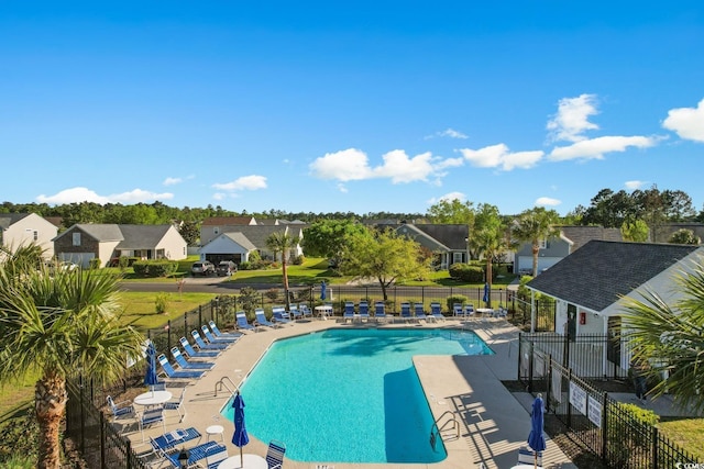 632 Kindred Dr, Myrtle Beach, SC 29588 - community pool featuring a residential view and a patio area