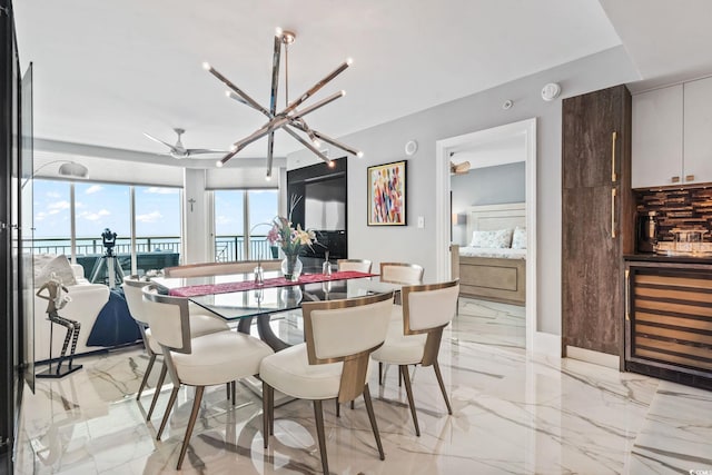 603 S Ocean Blvd Unit 1109, North Myrtle Beach, SC 29582 - dining area with light marble finish flooring and beverage cooler