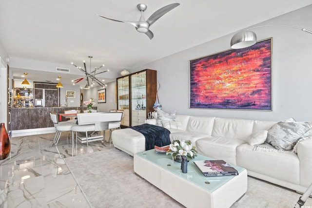 603 S Ocean Blvd Unit 1109, North Myrtle Beach, SC 29582 - living area featuring marble tiled flooring, a chandelier, and a ceiling fan