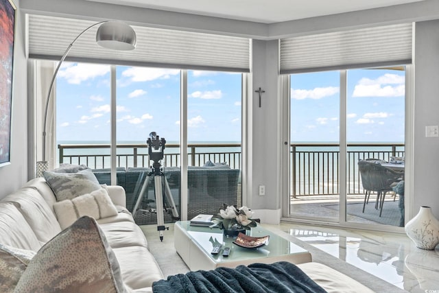 603 S Ocean Blvd Unit 1109, North Myrtle Beach, SC 29582 - living area with a water view and plenty of natural light