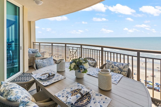 603 S Ocean Blvd Unit 1109, North Myrtle Beach, SC 29582 - balcony featuring view of water and beach and outdoor dining space