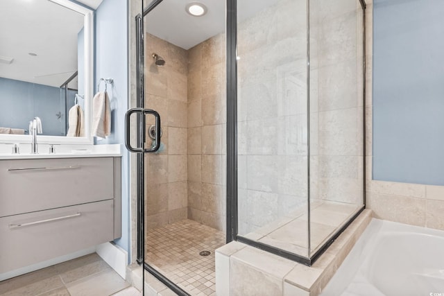 603 S Ocean Blvd Unit 1109, North Myrtle Beach, SC 29582 - full bathroom featuring a shower stall, vanity, and a garden tub
