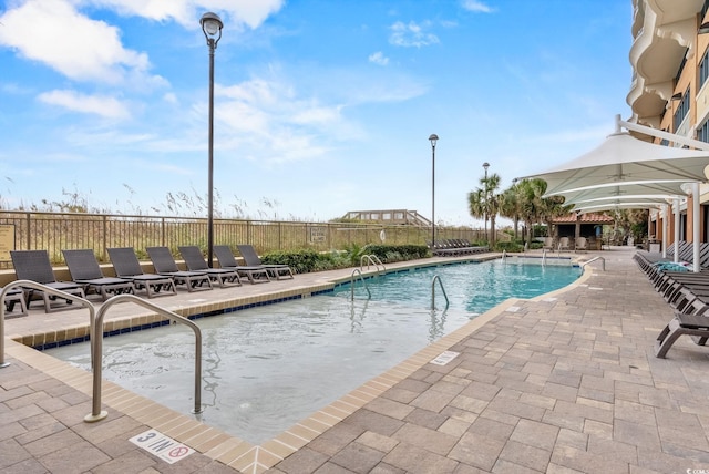 603 S Ocean Blvd Unit 1109, North Myrtle Beach, SC 29582 - community pool featuring a patio