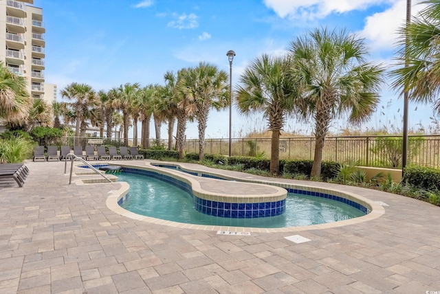 603 S Ocean Blvd Unit 1109, North Myrtle Beach, SC 29582 - community pool featuring a hot tub and a patio