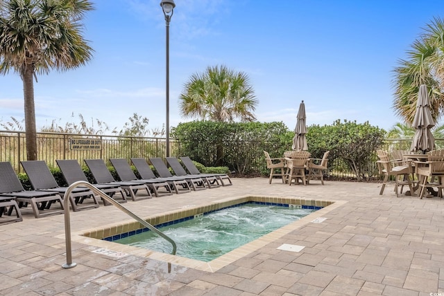 603 S Ocean Blvd Unit 1109, North Myrtle Beach, SC 29582 - view of swimming pool featuring outdoor dining space and a patio area
