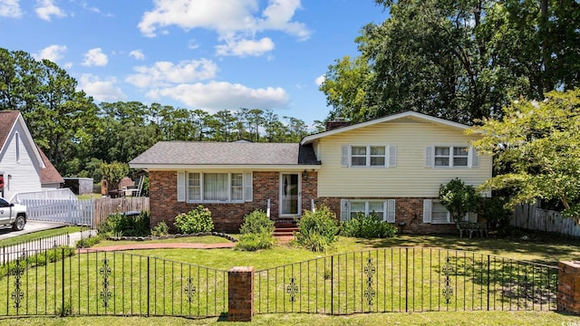 708 Charlotte Rd, Myrtle Beach, SC 29577 - split level home featuring brick siding, roof with shingles, and a chimney