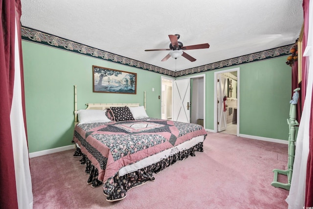 708 Charlotte Rd, Myrtle Beach, SC 29577 - carpeted bedroom with a textured ceiling, ensuite bathroom, and ceiling fan