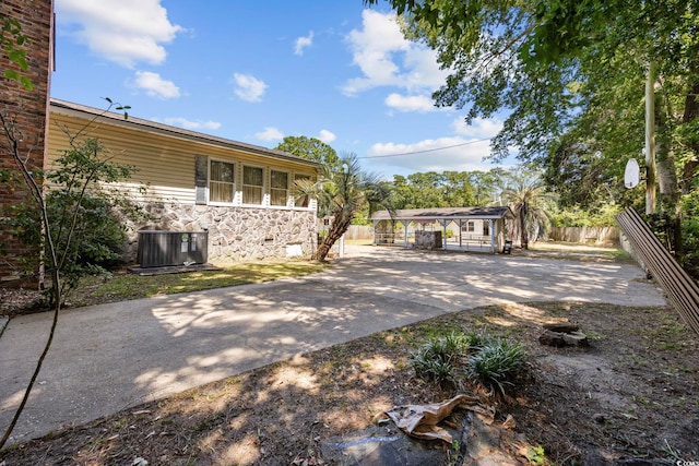708 Charlotte Rd, Myrtle Beach, SC 29577 - view of yard featuring concrete driveway