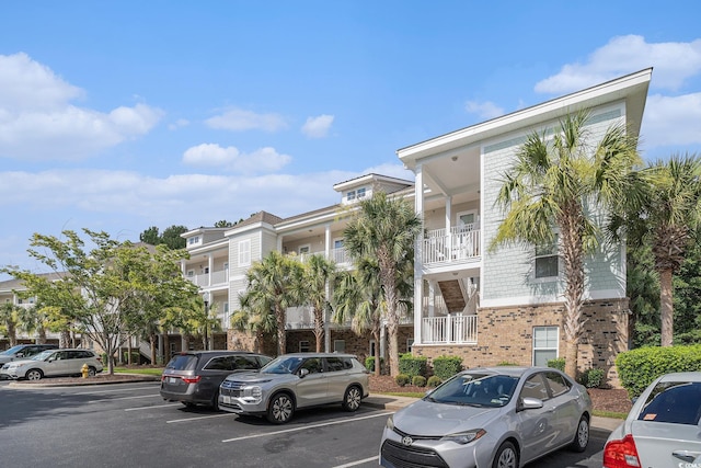 6253 Catalina Dr Unit 1113, North Myrtle Beach, SC 29582 - view of property featuring uncovered parking