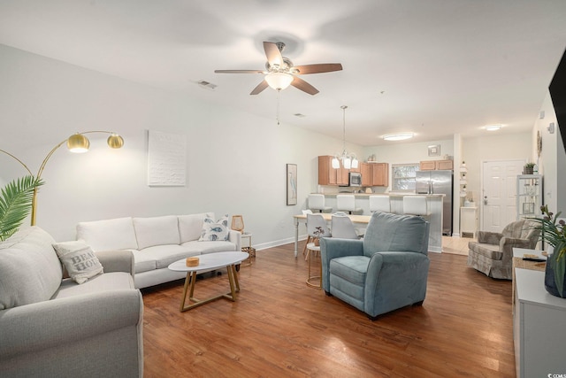 6253 Catalina Dr Unit 1113, North Myrtle Beach, SC 29582 - living area with ceiling fan, wood finished floors, and a chandelier