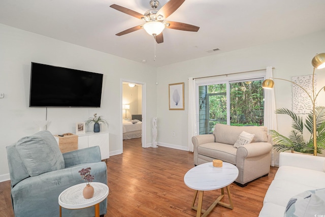 6253 Catalina Dr Unit 1113, North Myrtle Beach, SC 29582 - living area with light wood-style floors and a ceiling fan