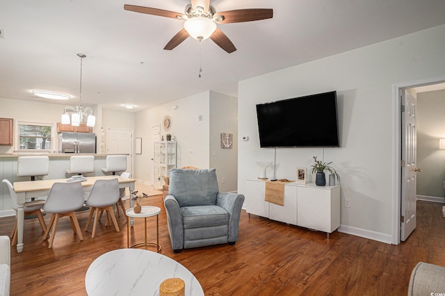 6253 Catalina Dr Unit 1113, North Myrtle Beach, SC 29582 - living room with wood finished floors, a ceiling fan, and a chandelier
