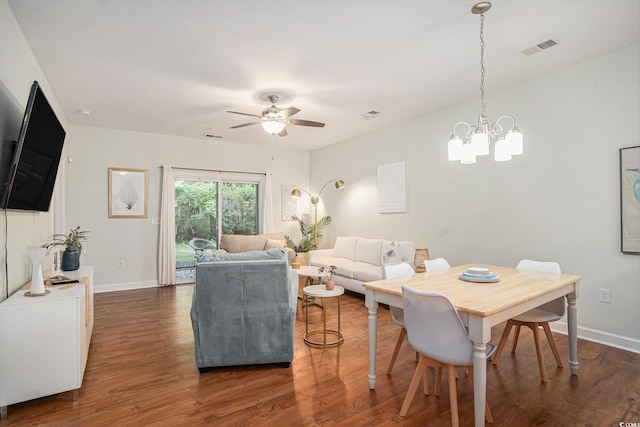 6253 Catalina Dr Unit 1113, North Myrtle Beach, SC 29582 - living room featuring dark wood-style flooring, a chandelier, and ceiling fan