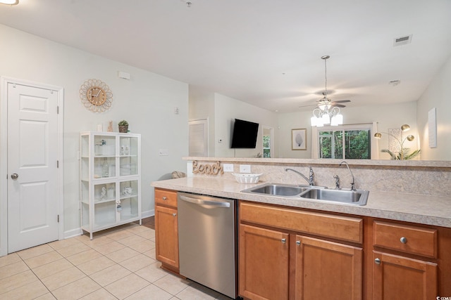 6253 Catalina Dr Unit 1113, North Myrtle Beach, SC 29582 - kitchen featuring dishwasher, light countertops, light tile patterned flooring, brown cabinets, and a ceiling fan