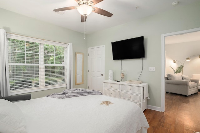 6253 Catalina Dr Unit 1113, North Myrtle Beach, SC 29582 - bedroom featuring wood finished floors and a ceiling fan