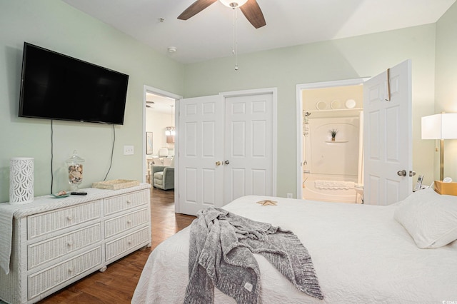 6253 Catalina Dr Unit 1113, North Myrtle Beach, SC 29582 - bedroom featuring dark wood-type flooring, connected bathroom, and ceiling fan