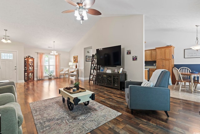 188 Governors Loop, Myrtle Beach, SC 29588 - living area featuring a chandelier, ceiling fan, wood finished floors, and high vaulted ceiling