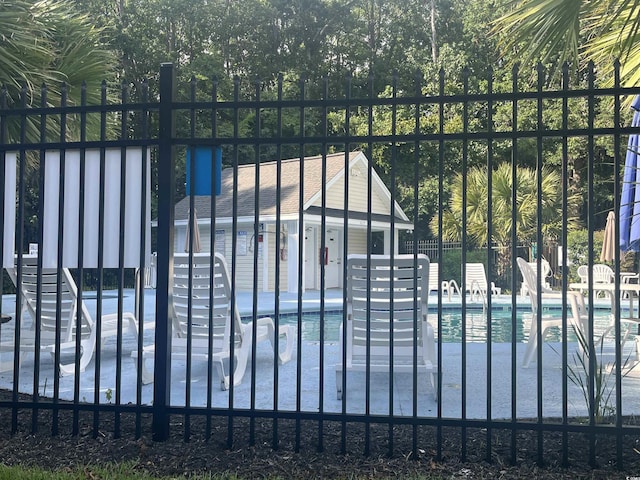 188 Governors Loop, Myrtle Beach, SC 29588 - gate featuring a community pool and a patio area