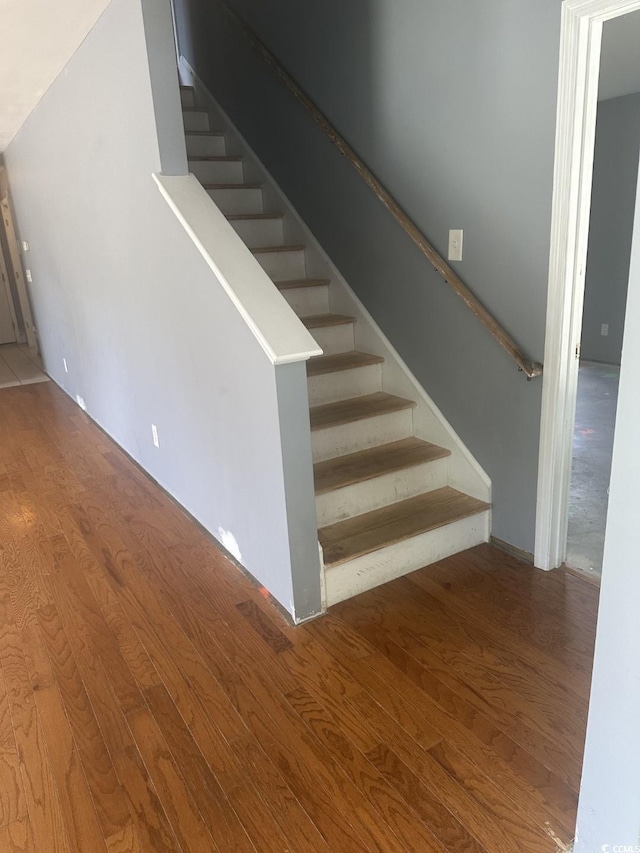 704 Coffee Tree Ct, Myrtle Beach, SC 29579 - stairway featuring wood finished floors