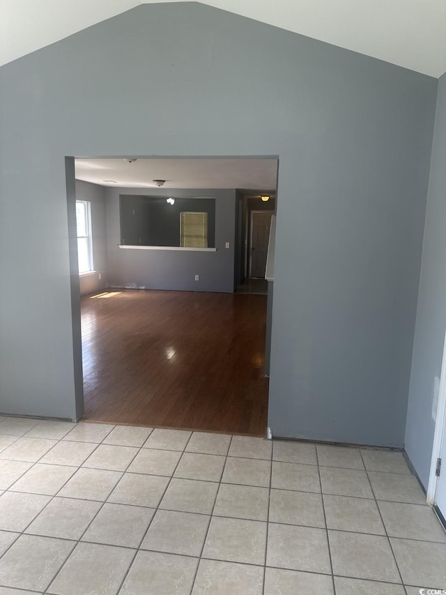 704 Coffee Tree Ct, Myrtle Beach, SC 29579 - unfurnished room featuring lofted ceiling and light tile patterned floors