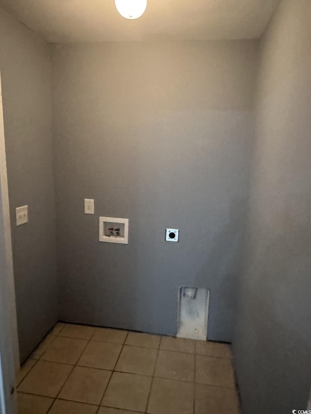 704 Coffee Tree Ct, Myrtle Beach, SC 29579 - laundry area with hookup for an electric dryer, hookup for a washing machine, and light tile patterned floors