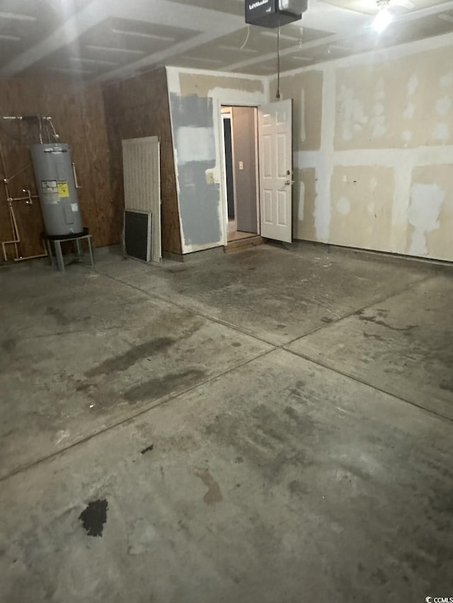 704 Coffee Tree Ct, Myrtle Beach, SC 29579 - garage featuring water heater and a garage door opener
