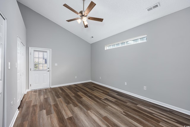 1315 Melanie Ln, Myrtle Beach, SC 29577 - empty room with ceiling fan, dark wood-style flooring, and high vaulted ceiling