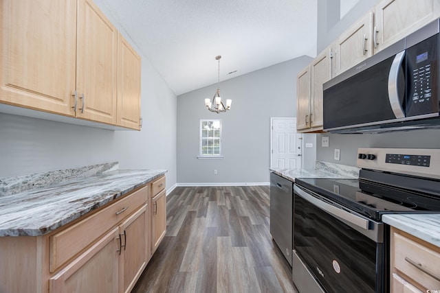 1315 Melanie Ln, Myrtle Beach, SC 29577 - kitchen featuring stainless steel appliances, light brown cabinets, lofted ceiling, dark wood-style floors, and a chandelier