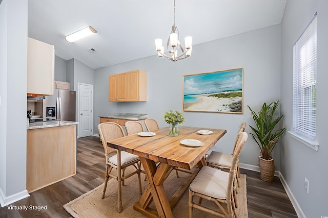 1315 Melanie Ln, Myrtle Beach, SC 29577 - dining area featuring a chandelier, dark wood-style floors, and vaulted ceiling