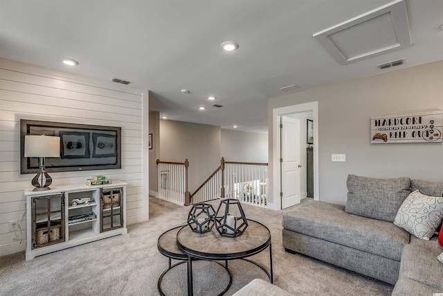 living room with light colored carpet