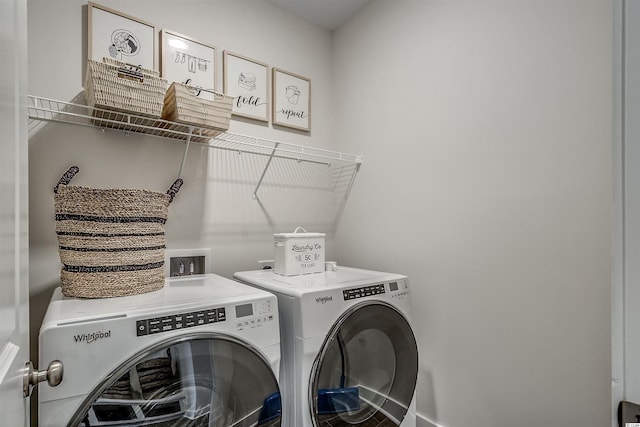 clothes washing area featuring washer hookup and independent washer and dryer