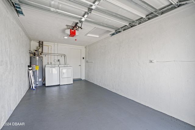 garage with electric water heater, a garage door opener, and separate washer and dryer