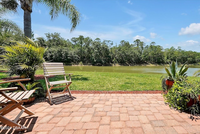 view of patio featuring a water view