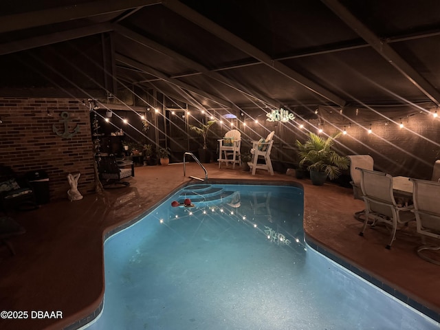 outdoor pool featuring a patio