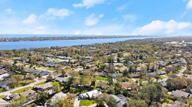 aerial view with a residential view and a water view