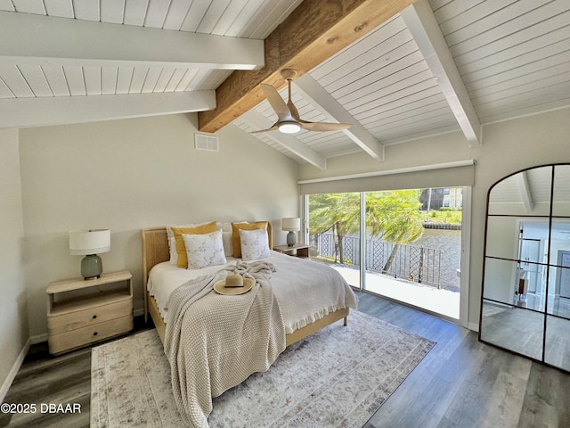 bedroom with access to exterior, visible vents, wood finished floors, baseboards, and vaulted ceiling with beams