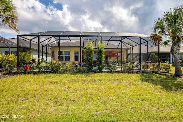 view of yard featuring glass enclosure